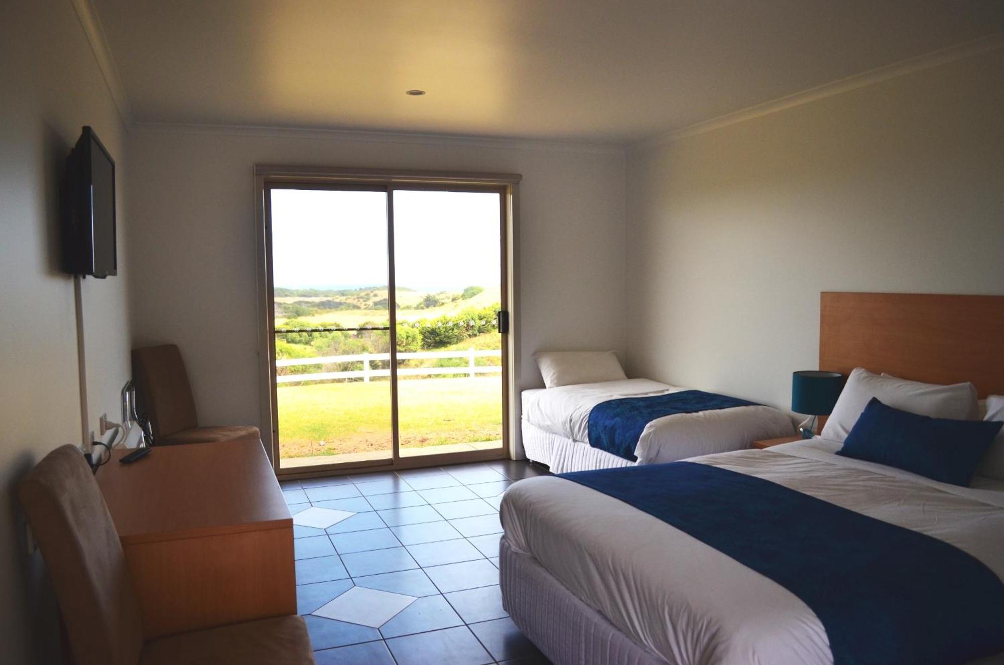 Island Breeze Motel Currie Habitación foto